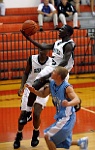Basketball Layup PIM 029  A basketball player drives the lane for a layup during a high school game. - PhotosinMotion.net. : basket player layoup photos, basketball players photographer, high school sports photographer, SPORTS, BASKETBALL, pictures sports Tampa Bay